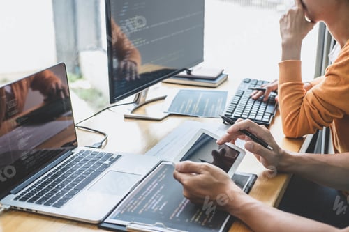 Preview: Programmers Cooperating At Developing Programming And Website Working In A Software Develop Company