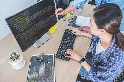 Preview: Writing Codes And Typing Data Code Technology, Two Professional Programmer Cooperating Working On