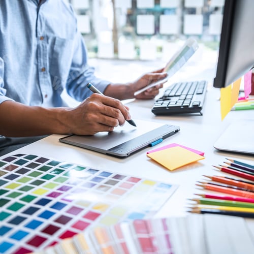 Preview: Two Colleague Creative Graphic Designer Working On Color Selection And Color Swatches, Drawing On