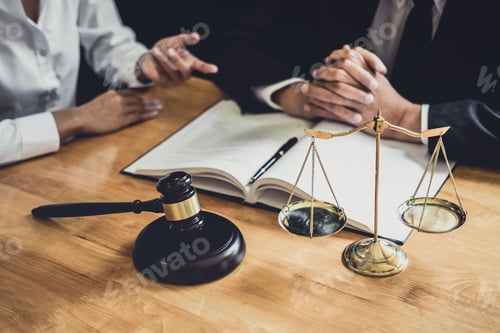 Preview: Male Lawyer Or Counselor Working In Courtroom Have Meeting With Client Are Consultation With