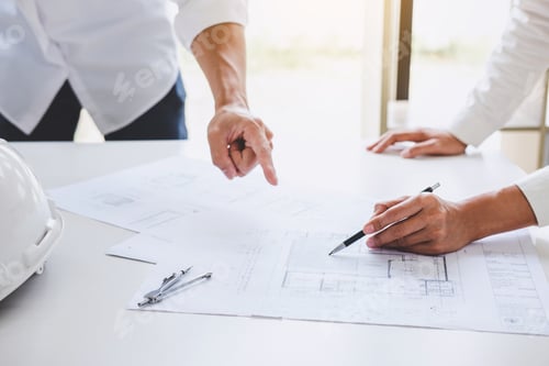 Preview: Architect Or Engineer Meeting Working With Partner On Blueprint For Architectural Project In