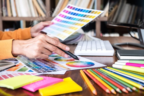 Preview: Image Of Female Creative Graphic Designer Working On Color Selection And Drawing On Graphics Tablet
