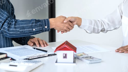 Preview: Real Estate Agent And Customers Shaking Hands Together Celebrating Finished Contract After Signing