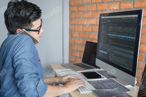 Preview: Young Professional Programmer Working At Developing Programming And Website Working In A Software