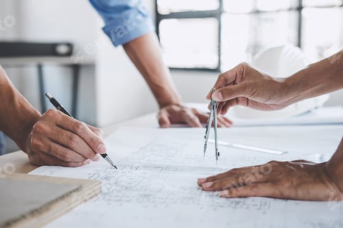 Preview: Architects Reviewing Blueprint in Office Workplace
