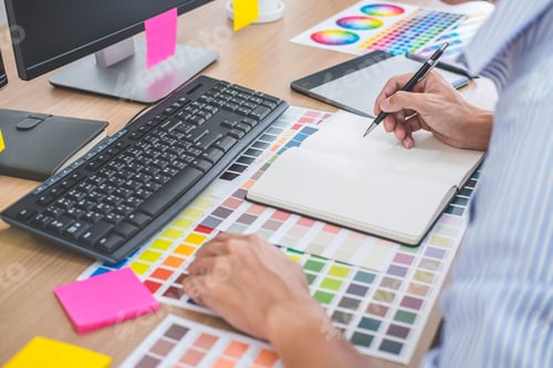Preview: Image Of Male Creative Graphic Designer Working On Color Selection And Drawing On Graphics Tablet