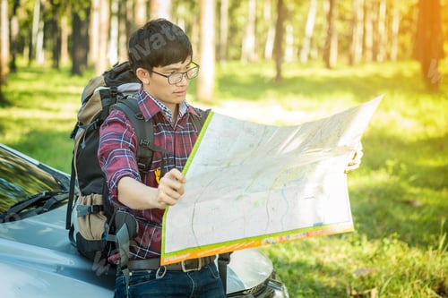Preview: Young Man Traveler With Backpack Handle Map Relaxing Outdoor On Background Summer Vacations And