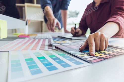 Preview: Two Colleague Creative Graphic Designer Working On Color Selection And Color Swatches, Drawing On