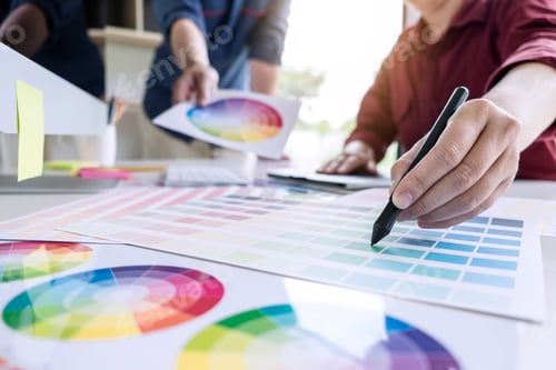 Preview: Two Colleague Creative Graphic Designer Working On Color Selection And Color Swatches, Drawing On
