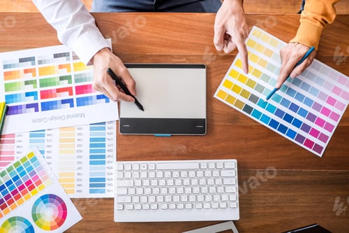 Preview: Two Colleague Creative Graphic Designer Working On Color Selection And Color Swatches, Drawing On