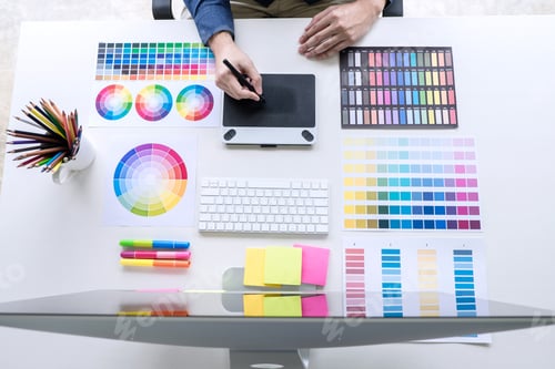 Preview: Image Of Male Creative Graphic Designer Working On Color Selection And Drawing On Graphics Tablet