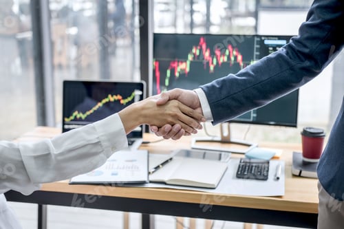 Preview: Business Handshake After Discussion And Analyzing Graph Stock Market Trading Good Deal Of Trading