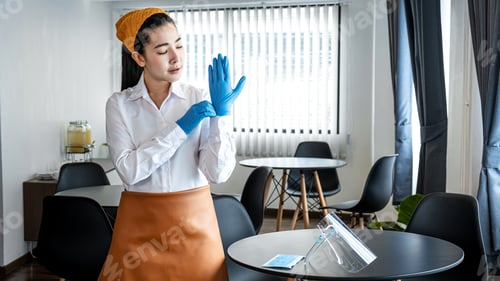 Preview: Asian Woman Waitress Wearing Glove And Face Shield To Prevent And Stop Coronavirus Before Working