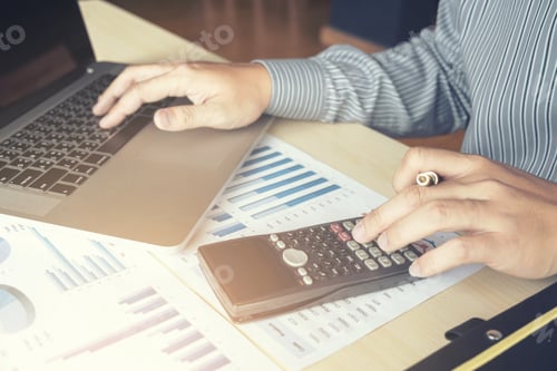 Preview: Business Man Or Accountant Working Financial Investment On Calculator With Calculate Analyze
