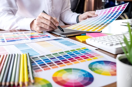 Preview: Image Of Male Creative Graphic Designer Working On Color Selection And Drawing On Graphics Tablet