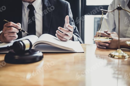 Preview: Male Lawyer Or Counselor Working In Courtroom Have Meeting With Client Are Consultation With