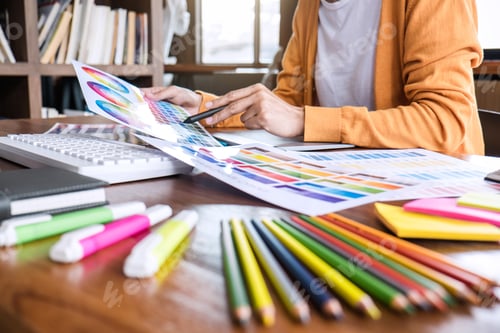 Preview: Image Of Female Creative Graphic Designer Working On Color Selection And Drawing On Graphics Tablet