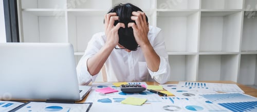 Preview: Image Of Frustrated Stressed Businessman And Graph Document With Computer Laptop In The Workplace.