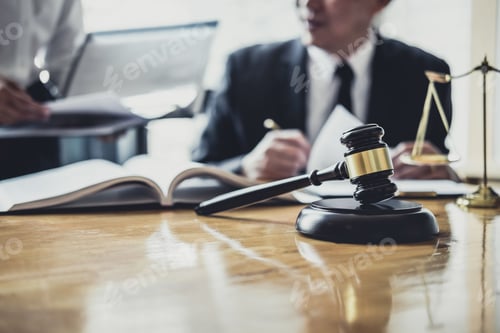 Preview: Male Lawyer Or Counselor Working In Courtroom Have Meeting With Client Are Consultation With
