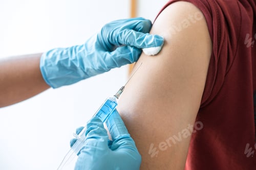 Preview: Doctor Making Injection Vaccination Patient To Prevent Pandemic Of The Disease, Flu Or Influenza