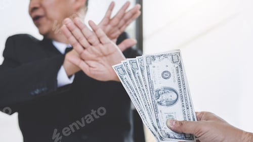 Preview: Bribery And Corruption Concept, Businessman Refusing Receive Money In The Envelope To Agreement