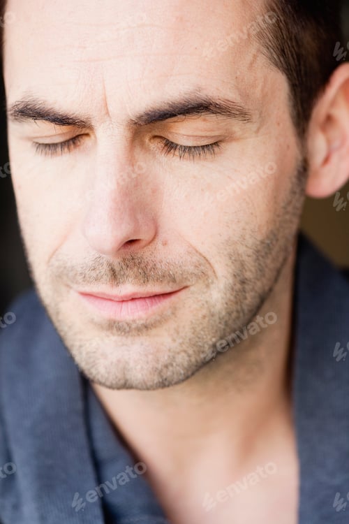 Preview: Man Listening With Eyes Closed