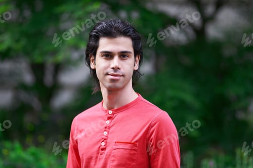 Preview: Portrait Of Young Man Wearing Red Top
