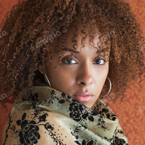 Preview: Portrait Of A Young Woman Staring At The Camera With Attitude