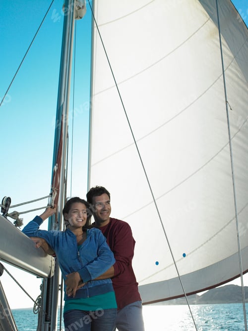 Preview: Young Couple Relaxing On Yacht Smiling