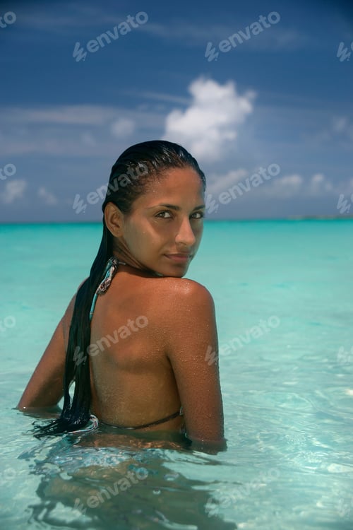 Preview: Woman Standing In Tropical Water