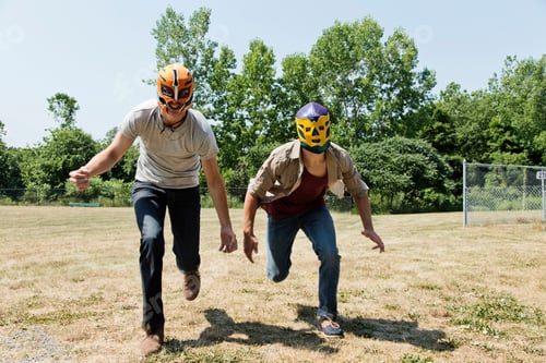 Preview: Two Young Men Wearing Wrestling Masks