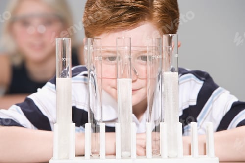 Preview: Boy Looking At Test Tubes