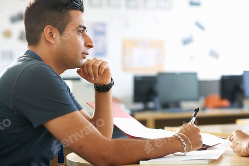 Preview: Male Student Having Classroom Tutorial