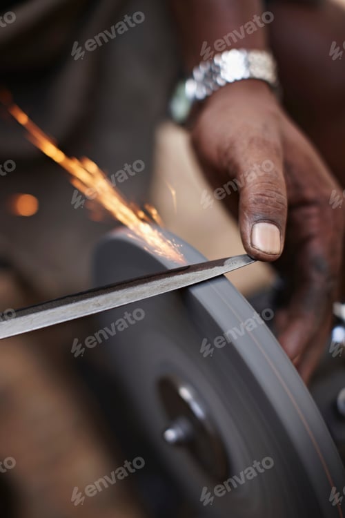 Preview: Close Up Of Man Sharpening Tool