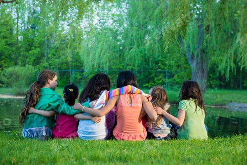 Preview: Friends Sitting By Lake
