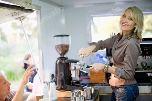 Preview: Woman Making Coffee In Food Cart