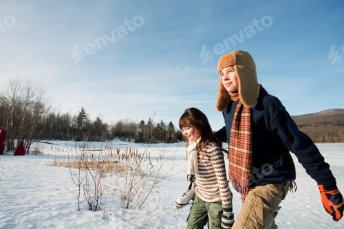 Preview: Brother And Sister Walking In Snow
