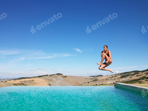 Preview: Woman Jumping In Swimming Pool
