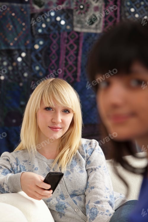 Preview: Two Relaxed Women Looking To Camera