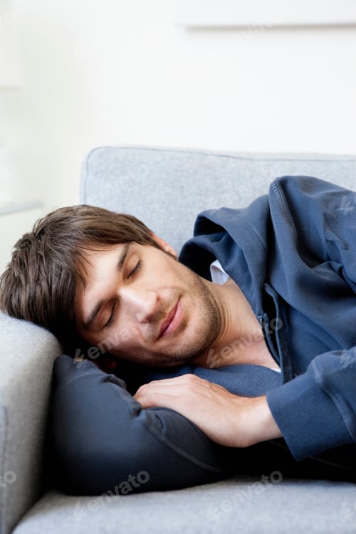 Preview: Man Sleeping On Sofa