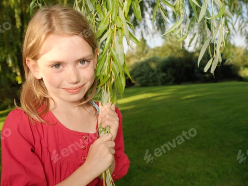 Preview: Young Girl Pulling On Branch
