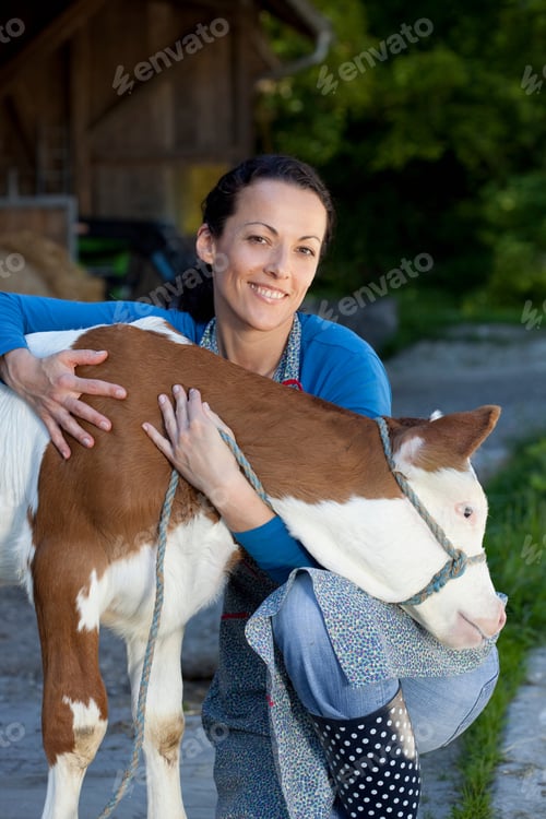 Preview: Farmwoman Hugging Calf