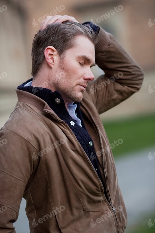 Preview: Man Stroking Through His Hair