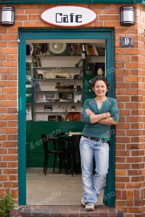 Preview: Woman Standing In Front Of A Cafe