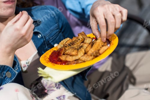 Preview: Cropped Close Up Of Couple Eating Chips