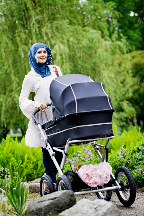 Preview: Woman In Headscarf Pushing Stroller