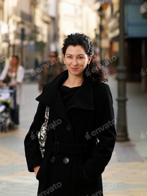 Preview: Woman Wearing Black Coat In Street