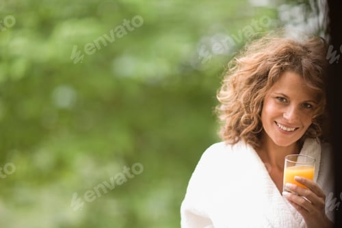 Preview: Woman Enjoying An Orange Juice