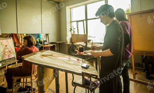 Preview: Three Young Female Artists Painting In Studio