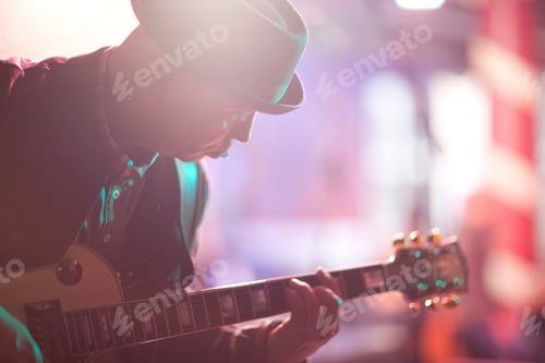 Preview: Close Up Mature Man Playing Guitar On Stage